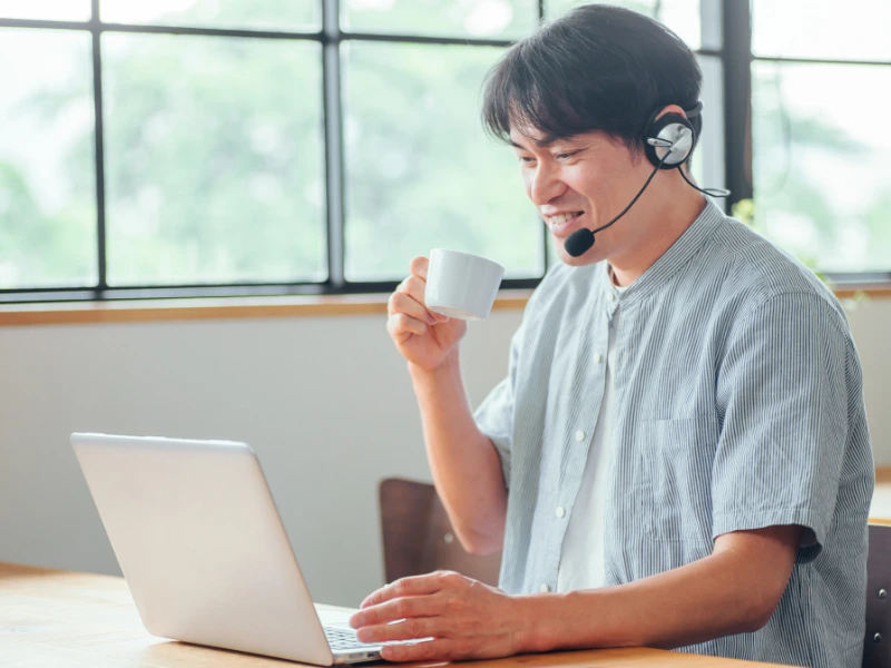 Man making a laptop call from home using the technology behind how WebRTC works